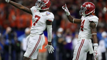 NEW ORLEANS, LA - JANUARY 01: Trevon Diggs #7 of the Alabama Crimson Tide and Deionte Thompson #14 react in the second half fo the AllState Sugar Bowl against the Clemson Tigers at the Mercedes-Benz Superdome on January 1, 2018 in New Orleans, Louisiana. (Photo by Ronald Martinez/Getty Images)