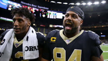 NEW ORLEANS, LOUISIANA - NOVEMBER 24: Cameron Jordan #94 of the New Orleans Saints and Michael Thomas #13 react during a game against the Carolina Panthers at the Mercedes Benz Superdome on November 24, 2019 in New Orleans, Louisiana. (Photo by Jonathan Bachman/Getty Images)