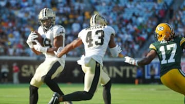 New Orleans Saints cornerback Paulson Adebo (29) intercepts a pass from Green Bay Packers quarterback Aaron Rodgers (12) during early third quarter action. The New Orleans Saints hosted the the Green Bay Packers at TIAA Bank Field in Jacksonville, FL Sunday, September 12, 2021 after the Saint's home game had to be move from New Orleans after Hurricane Ida hit the Louisiana coast. The Saints went into the half with a 17 to 3 lead over the Packers and walked away with a 38 to 3 win in their season opening home game away from home.Jki 091221 Saintsvspackers 13