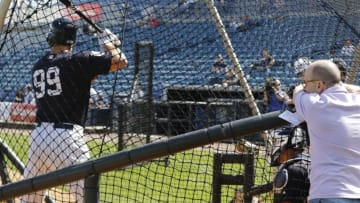 Feb 22, 2016; Tampa, FL, USA; New York Yankees general manager Brian Cashman watches as outfielder Aaron Judge takes batting practice at George M. Steinbrenner Stadium. Mandatory Credit: Butch Dill-USA TODAY Sports