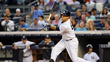 Jun 18, 2015; Bronx, NY, USA; New York Yankees center fielder Mason Williams (63) doubles to left during the second inning against the Miami Marlins at Yankee Stadium. Mandatory Credit: Anthony Gruppuso-USA TODAY Sports