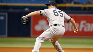 Sep 21, 2016; St. Petersburg, FL, USA; New York Yankees relief pitcher Jonathan Holder (65) throws a pitch against the Tampa Bay Rays at Tropicana Field. New York Yankees defeated the Tampa Bay Rays 11-5. Mandatory Credit: Kim Klement-USA TODAY Sports