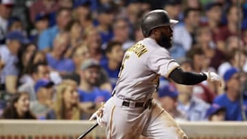 Aug 29, 2016; Chicago, IL, USA; Pittsburgh Pirates second baseman Josh Harrison (5) hits a two run RBI double during the seventh inning against the Chicago Cubs at Wrigley Field. Mandatory Credit: Caylor Arnold-USA TODAY Sports