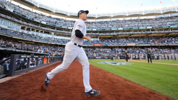 NEW YORK, NEW YORK - OCTOBER 15: Giancarlo Stanton #27 of the New York Yankees takes the field as he is introduced prior to game three of the American League Championship Series against the Houston Astros at Yankee Stadium on October 15, 2019 in New York City. (Photo by Elsa/Getty Images)