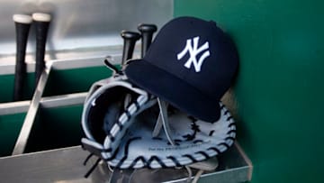 PITTSBURGH, PA - APRIL 21: A New York Yankees hat and Rawlings baseball glove is seen during the game against the Pittsburgh Pirates at PNC Park on April 21, 2017 in Pittsburgh, Pennsylvania. (Photo by Justin K. Aller/Getty Images) *** Local Caption ***