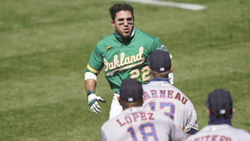 OAKLAND, CALIFORNIA - AUGUST 09: Ramon Laureano #22 of the Oakland Athletics charges towards the Houston Astros dugout after he was hit by a pitch in the bottom of the seventh inning at RingCentral Coliseum on August 09, 2020 in Oakland, California. (Photo by Thearon W. Henderson/Getty Images)
