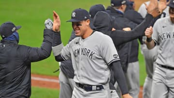 CLEVELAND, OHIO - SEPTEMBER 30: Aaron Judge #99 of the New York Yankees celebrates with a teammate after the Yankees defeated the Cleveland Indians in Game Two of the American League Wild Card Series at Progressive Field on September 30, 2020 in Cleveland, Ohio. The Yankees defeated the Indians 10-9. (Photo by Jason Miller/Getty Images)