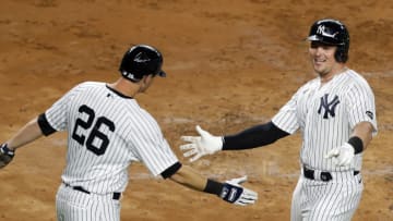 NEW YORK, NEW YORK - SEPTEMBER 15: (NEW YORK DALIES OUT) Luke Voit #59 and DJ LeMahieu #26 of the New York Yankees celebrate against the Toronto Blue Jays at Yankee Stadium on September 15, 2020 in New York City. The Yankees defeated the Blue Jays 20-6. (Photo by Jim McIsaac/Getty Images)