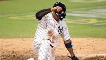 SAN DIEGO, CALIFORNIA - OCTOBER 08: Gleyber Torres #25 of the New York Yankees scores a run against the Tampa Bay Rays during the eighth inning in Game Four of the American League Division Series at PETCO Park on October 08, 2020 in San Diego, California. (Photo by Christian Petersen/Getty Images)