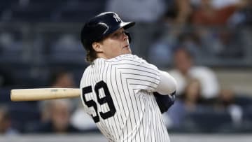 NEW YORK, NY - AUGUST 17: Luke Voit #59 of the New York Yankees hits a home run against the Boston Red Sox in the second inning during game two of a doubleheader at Yankee Stadium on August 17, 2021 in New York City. (Photo by Adam Hunger/Getty Images)