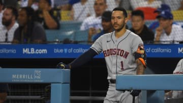 LOS ANGELES, CA - AUGUST 03: Carlos Correa #1 of the Houston Astros looks on from the dugout steps during the first inning of the game against the Los Angeles Dodgers at Dodger Stadium on August 3, 2021 in Los Angeles, California. (Photo by Jayne Kamin-Oncea/Getty Images)