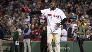 BOSTON, MA - SEPTEMBER 26: Former Boston Red Sox designated hitter David Ortiz is introduced before catching a ceremonial first pitch from the family of fallen Sergeant Johanny Rosario Pichardo before a game between the Boston Red Sox and the New York Yankees on September 26, 2021 at Fenway Park in Boston, Massachusetts. (Photo by Billie Weiss/Boston Red Sox/Getty Images)