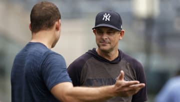 NEW YORK, NY - AUGUST 17: Aaron Boone #17 of the New York Yankees talks with Anthony Rizzo #48 of the New York Yankees before taking on the Boston Red Sox at Yankee Stadium on August 17, 2021 in New York City. (Photo by Adam Hunger/Getty Images)