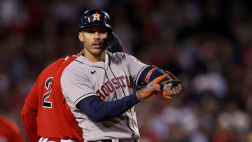 BOSTON, MASSACHUSETTS - OCTOBER 19: Carlos Correa #1 of the Houston Astros reacts after he hit a double against the Boston Red Sox in the ninth inning of Game Four of the American League Championship Series at Fenway Park on October 19, 2021 in Boston, Massachusetts. (Photo by Elsa/Getty Images)