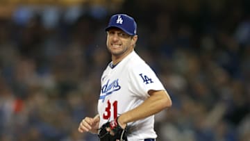 LOS ANGELES, CALIFORNIA - OCTOBER 11: Max Scherzer #31 of the Los Angeles Dodgers reacts after striking out LaMonte Wade Jr. #31 of the San Francisco Giants during the fourth inning in game 3 of the National League Division Series at Dodger Stadium on October 11, 2021 in Los Angeles, California. (Photo by Ronald Martinez/Getty Images)