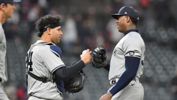 CLEVELAND, OHIO - APRIL 23: Catcher Gary Sanchez #24 celebrates with closing pitcher Aroldis Chapman #54 of the New York Yankees after the Yankees defeated the Cleveland Indians at Progressive Field on April 23, 2021 in Cleveland, Ohio. The Yankees defeated the Indians 5-3. (Photo by Jason Miller/Getty Images)