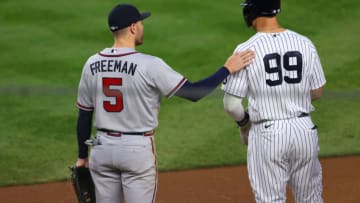 NEW YORK, NY - APRIL 20: Freddie Freeman #5 of the Atlanta Braves talks with Aaron Judge #99 of the New York Yankees during an MLB baseball game at Yankee Stadium on April 20, 2021 in New York City. The Yankees defeated the Braves 3-1. (Photo by Rich Schultz/Getty Images)
