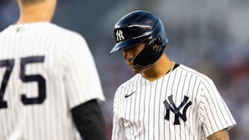 NEW YORK, NEW YORK - JUNE 14: Gleyber Torres #25 of the New York Yankees after reaching first base on a fielding error during the fourth inning of the game against the Tampa Bay Rays at Yankee Stadium on June 14, 2022 in New York City. (Photo by Dustin Satloff/Getty Images)