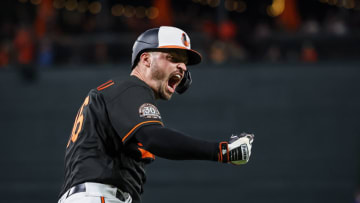 BALTIMORE, MD - JULY 08: Trey Mancini #16 of the Baltimore Orioles celebrates after hitting a walk-off RBI single against the Los Angeles Angels during the ninth inning at Oriole Park at Camden Yards on July 8, 2022 in Baltimore, Maryland. (Photo by Scott Taetsch/Getty Images)