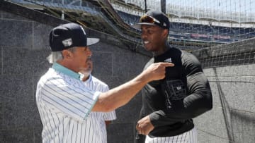 NEW YORK, NEW YORK - JULY 30: (NEW YORK DAILIES OUT) Ron Guidry (L) talks with Aroldis Chapman #54 during New York Yankees Old Timers' Day before a game against the Kansas City Royals at Yankee Stadium on Saturday, July 30, 2022 in New York City. The Yankees defeated the Royals 8-2. (Photo by Jim McIsaac/Getty Images)