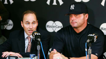 NEW YORK - MAY 06: General Manager Brian Cashman of the New York Yankees (L) speaks to the media as the team announced the signing of Roger Clemens after the Yankees defeated the Seattle Mariners at Yankee Stadium on May 6, 2007 in the Bronx borough of New York City. (Photo by Jim McIsaac/Getty Images)