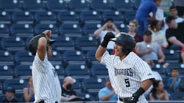 Hudson Valley Renegade Anthony Volpe celebrates hitting a home run with Wilkerman Garcia during Tuesday's game versus Jersey Shore on August 10, 2021.Hudson Valley Renegades Anthony Volpe