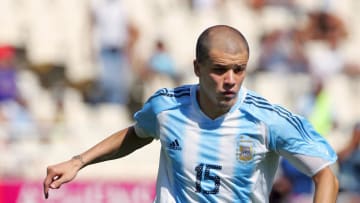 Argentine's Andres D'Alessandro dribbles