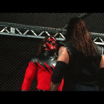 Kane makes his stunning debut during Undertaker’s Hell in a Cell Match: Badd Blood: In Your House