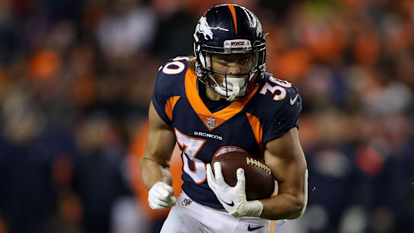 DENVER, COLORADO - DECEMBER 15: Phillip Lindsay #30 of the Denver Broncos carries the ball against the Cleveland Browns at Broncos Stadium at Mile High on December 15, 2018 in Denver, Colorado. (Photo by Matthew Stockman/Getty Images) DENVER, COLORADO - DECEMBER 15: Phillip Lindsay #30 of the Denver Broncos carries the ball against the Cleveland Browns at Broncos Stadium at Mile High on December 15, 2018 in Denver, Colorado. (Photo by Matthew Stockman/Getty Images)