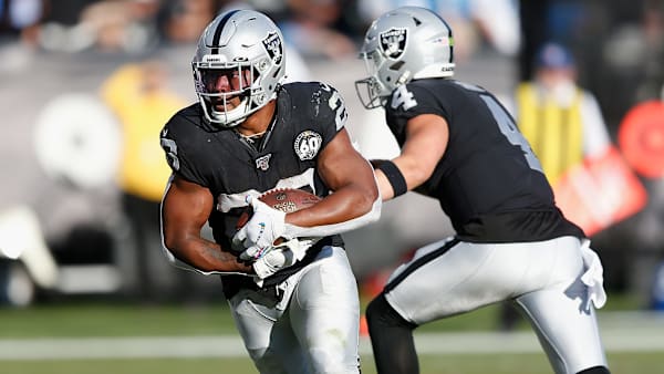 OAKLAND, CALIFORNIA - NOVEMBER 03: Josh Jacobs #28 of the Oakland Raiders takes a handoff from quarterback Derek Carr #4 at RingCentral Coliseum on November 03, 2019 in Oakland, California. (Photo by Lachlan Cunningham/Getty Images) OAKLAND, CALIFORNIA - NOVEMBER 03: Josh Jacobs #28 of the Oakland Raiders takes a handoff from quarterback Derek Carr #4 at RingCentral Coliseum on November 03, 2019 in Oakland, California. (Photo by Lachlan Cunningham/Getty Images)