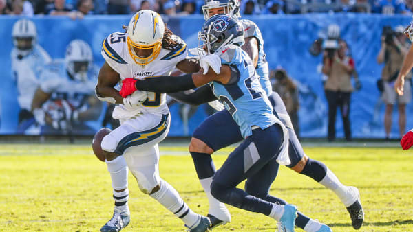 NASHVILLE, TENNESSEE - OCTOBER 20: Adoree' Jackson #25 of the Tennessee Titans pokes the ball out of the hands of Melvin Gordon #25 of the Los Angeles Chargers during the first half at Nissan Stadium on October 20, 2019 in Nashville, Tennessee. (Photo by Frederick Breedon/Getty Images) NASHVILLE, TENNESSEE - OCTOBER 20: Adoree' Jackson #25 of the Tennessee Titans pokes the ball out of the hands of Melvin Gordon #25 of the Los Angeles Chargers during the first half at Nissan Stadium on October 20, 2019 in Nashville, Tennessee. (Photo by Frederick Breedon/Getty Images)