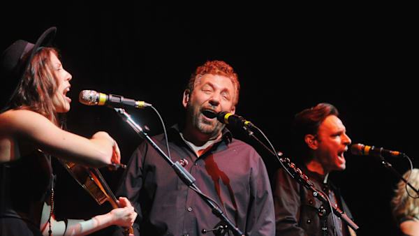 HUNTINGTON, NY - JULY 12: James L. Dolan (C), Marc Copely (R) and Erin Slaver (L) of JD & The Straight Shot perform at The Paramount Theater on July 12, 2019 in Huntington, New York. (Photo by Bobby Bank/Getty Images) HUNTINGTON, NY - JULY 12: James L. Dolan (C), Marc Copely (R) and Erin Slaver (L) of JD & The Straight Shot perform at The Paramount Theater on July 12, 2019 in Huntington, New York. (Photo by Bobby Bank/Getty Images)