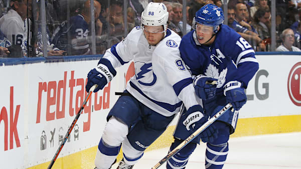TORONTO, ON - OCTOBER 10: Mikhail Sergchev #98 of the Tampa Bay Lightning skates from a checking Mitchell Marner #16 of the Toronto Maple Leafs during an NHL game at Scotiabank Arena on October 10, 2019 in Toronto, Ontario, Canada. The Lightning defeated the Maple Leafs 7-3. (Photo by Claus Andersen/Getty Images) TORONTO, ON - OCTOBER 10: Mikhail Sergchev #98 of the Tampa Bay Lightning skates from a checking Mitchell Marner #16 of the Toronto Maple Leafs during an NHL game at Scotiabank Arena on October 10, 2019 in Toronto, Ontario, Canada. The Lightning defeated the Maple Leafs 7-3. (Photo by Claus Andersen/Getty Images)
