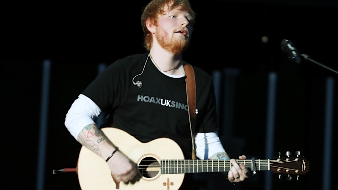 JOHANNESBURG, SOUTH AFRICA - DECEMBER 02: Ed Sheeran performs during the Global Citizen Festival: Mandela 100 at FNB Stadium on December 2, 2018 in Johannesburg, South Africa. (Photo by Jemal Countess/Getty Images for Global Citizen Festival: Mandela 100) JOHANNESBURG, SOUTH AFRICA - DECEMBER 02: Ed Sheeran performs during the Global Citizen Festival: Mandela 100 at FNB Stadium on December 2, 2018 in Johannesburg, South Africa. (Photo by Jemal Countess/Getty Images for Global Citizen Festival: Mandela 100)