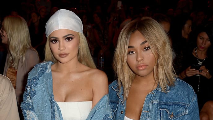 NEW YORK, NY - SEPTEMBER 10: Kylie Jenner (C) and Jordyn Woods (R) attend the Jonathan Simkhai fashion show during New York Fashion Week: The Shows at The Arc, Skylight at Moynihan Station on September 10, 2016 in New York City. (Photo by Gustavo Caballero/Getty Images for New York Fashion Week: The Shows) NEW YORK, NY - SEPTEMBER 10: Kylie Jenner (C) and Jordyn Woods (R) attend the Jonathan Simkhai fashion show during New York Fashion Week: The Shows at The Arc, Skylight at Moynihan Station on September 10, 2016 in New York City. (Photo by Gustavo Caballero/Getty Images for New York Fashion Week: The Shows)