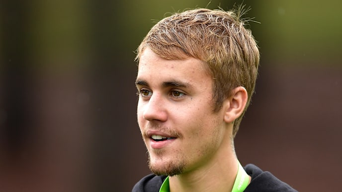 CHARLOTTE, NC - AUGUST 08: Musician Justin Bieber attends a practice round prior to the 2017 PGA Championship at Quail Hollow Club on August 8, 2017 in Charlotte, North Carolina. (Photo by Stuart Franklin/Getty Images) CHARLOTTE, NC - AUGUST 08: Musician Justin Bieber attends a practice round prior to the 2017 PGA Championship at Quail Hollow Club on August 8, 2017 in Charlotte, North Carolina. (Photo by Stuart Franklin/Getty Images)
