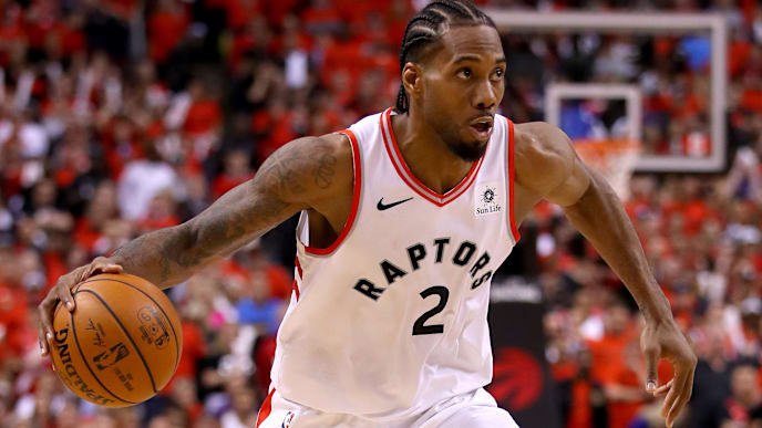 TORONTO, ONTARIO - JUNE 10: Kawhi Leonard #2 of the Toronto Raptors handles the ball on offense against the Golden State Warriors in the second half during Game Five of the 2019 NBA Finals at Scotiabank Arena on June 10, 2019 in Toronto, Canada. NOTE TO USER: User expressly acknowledges and agrees that, by downloading and or using this photograph, User is consenting to the terms and conditions of the Getty Images License Agreement. (Photo by Gregory Shamus/Getty Images) TORONTO, ONTARIO - JUNE 10: Kawhi Leonard #2 of the Toronto Raptors handles the ball on offense against the Golden State Warriors in the second half during Game Five of the 2019 NBA Finals at Scotiabank Arena on June 10, 2019 in Toronto, Canada. NOTE TO USER: User expressly acknowledges and agrees that, by downloading and or using this photograph, User is consenting to the terms and conditions of the Getty Images License Agreement. (Photo by Gregory Shamus/Getty Images)