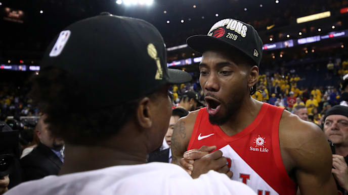 OAKLAND, CALIFORNIA - JUNE 13: Kawhi Leonard #2 of the Toronto Raptors celebrates his teams win victory over the Golden State Warriors in Game Six to win the 2019 NBA Finals at ORACLE Arena on June 13, 2019 in Oakland, California. NOTE TO USER: User expressly acknowledges and agrees that, by downloading and or using this photograph, User is consenting to the terms and conditions of the Getty Images License Agreement. (Photo by Ezra Shaw/Getty Images) OAKLAND, CALIFORNIA - JUNE 13: Kawhi Leonard #2 of the Toronto Raptors celebrates his teams win victory over the Golden State Warriors in Game Six to win the 2019 NBA Finals at ORACLE Arena on June 13, 2019 in Oakland, California. NOTE TO USER: User expressly acknowledges and agrees that, by downloading and or using this photograph, User is consenting to the terms and conditions of the Getty Images License Agreement. (Photo by Ezra Shaw/Getty Images)