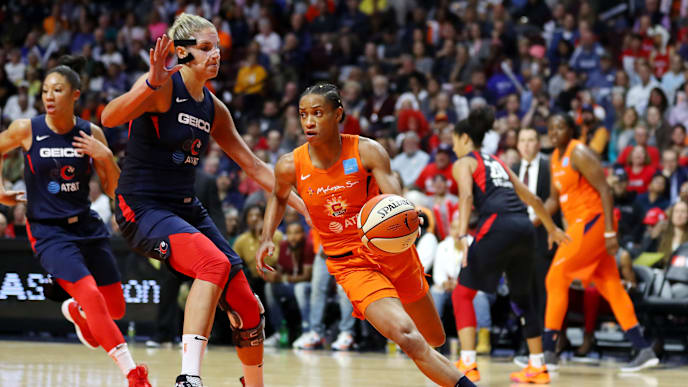 UNCASVILLE, CONNECTICUT - OCTOBER 08: Jasmine Thomas #5 of Connecticut Sun drives against Elena Delle Donne #11 of Washington Mystics during Game Four of the 2019 WNBA Finals between the Washington Mystics and Connecticut Sun at Mohegan Sun Arena on October 08, 2019 in Uncasville, Connecticut. The Sun defeat the Mystics 90-86. (Photo by Maddie Meyer/Getty Images) UNCASVILLE, CONNECTICUT - OCTOBER 08: Jasmine Thomas #5 of Connecticut Sun drives against Elena Delle Donne #11 of Washington Mystics during Game Four of the 2019 WNBA Finals between the Washington Mystics and Connecticut Sun at Mohegan Sun Arena on October 08, 2019 in Uncasville, Connecticut. The Sun defeat the Mystics 90-86. (Photo by Maddie Meyer/Getty Images)