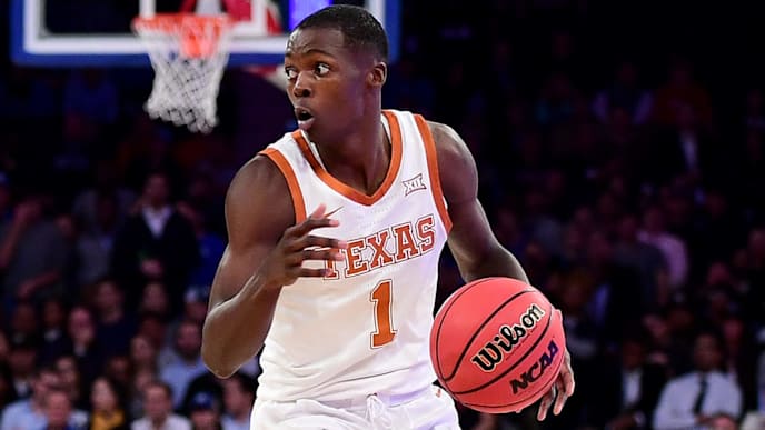 NEW YORK, NEW YORK - NOVEMBER 21: Andrew Jones #1 of the Texas Longhorns drives past Qudus Wahab #34 of the Georgetown Hoyas during the second half of their game at Madison Square Garden on November 21, 2019 in New York City. (Photo by Emilee Chinn/Getty Images) NEW YORK, NEW YORK - NOVEMBER 21: Andrew Jones #1 of the Texas Longhorns drives past Qudus Wahab #34 of the Georgetown Hoyas during the second half of their game at Madison Square Garden on November 21, 2019 in New York City. (Photo by Emilee Chinn/Getty Images)