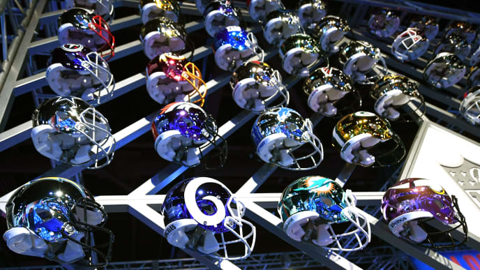 Team helmets are on display at the Super Bowl Experience at the World Congress Center in Atlanta, Georgia February 1, 2019. - The New England Patriots will meet the Los Angeles Ram at Super Bowl LIII on February 3. (Photo by TIMOTHY A. CLARY / AFP) (Photo credit should read TIMOTHY A. CLARY/AFP/Getty Images) Team helmets are on display at the Super Bowl Experience at the World Congress Center in Atlanta, Georgia February 1, 2019. - The New England Patriots will meet the Los Angeles Ram at Super Bowl LIII on February 3. (Photo by TIMOTHY A. CLARY / AFP) (Photo credit should read TIMOTHY A. CLARY/AFP/Getty Images)