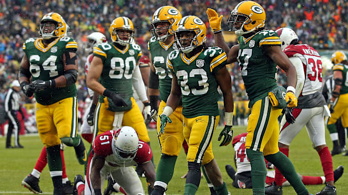 GREEN BAY, WISCONSIN - DECEMBER 02: Aaron Jones #33 of the Green Bay Packers celebrates after scoring a touchdown during the second half of a game against the Arizona Cardinals at Lambeau Field on December 02, 2018 in Green Bay, Wisconsin. (Photo by Dylan Buell/Getty Images) GREEN BAY, WISCONSIN - DECEMBER 02: Aaron Jones #33 of the Green Bay Packers celebrates after scoring a touchdown during the second half of a game against the Arizona Cardinals at Lambeau Field on December 02, 2018 in Green Bay, Wisconsin. (Photo by Dylan Buell/Getty Images)