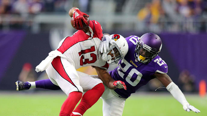 MINNEAPOLIS, MN - OCTOBER 14: Christian Kirk #13 of the Arizona Cardinals is tackled with the ball by Mackensie Alexander #20 of the Minnesota Vikings in the fourth quarter of the game at U.S. Bank Stadium on October 14, 2018 in Minneapolis, Minnesota. (Photo by Adam Bettcher/Getty Images) MINNEAPOLIS, MN - OCTOBER 14: Christian Kirk #13 of the Arizona Cardinals is tackled with the ball by Mackensie Alexander #20 of the Minnesota Vikings in the fourth quarter of the game at U.S. Bank Stadium on October 14, 2018 in Minneapolis, Minnesota. (Photo by Adam Bettcher/Getty Images)
