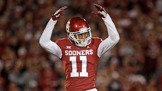 NORMAN, OK - SEPTEMBER 22: Cornerback Parnell Motley #11 of the Oklahoma Sooners waves to the crowd during the game against the Army Black Knights at Gaylord Family Oklahoma Memorial Stadium on September 22, 2018 in Norman, Oklahoma. The Sooners defeated the Black Knights 28-21 in overtime. (Photo by Brett Deering/Getty Images) NORMAN, OK - SEPTEMBER 22: Cornerback Parnell Motley #11 of the Oklahoma Sooners waves to the crowd during the game against the Army Black Knights at Gaylord Family Oklahoma Memorial Stadium on September 22, 2018 in Norman, Oklahoma. The Sooners defeated the Black Knights 28-21 in overtime. (Photo by Brett Deering/Getty Images)