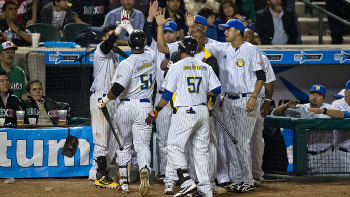 Players of Magallanes of Venezuela celebrates their victory against Yaquis de Obregon of Mexico, during the 2013 Baseball Caribbean Series, on February 2, 2013, in Hermosillo, Sonora State, northern Mexico. AFP PHOTO/Ronaldo Schemidt (Photo credit should read Ronaldo Schemidt/AFP/Getty Images) Players of Magallanes of Venezuela celebrates their victory against Yaquis de Obregon of Mexico, during the 2013 Baseball Caribbean Series, on February 2, 2013, in Hermosillo, Sonora State, northern Mexico. AFP PHOTO/Ronaldo Schemidt (Photo credit should read Ronaldo Schemidt/AFP/Getty Images)