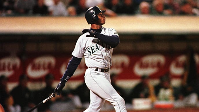 Seattle Mariners Ken Griffey Jr. watches his second home run sail out of the park 22 September against the Oakland Athletics in Oakland, CA. The home run gave Griffey 55 home runs so far this season and only six short of tying the record of 61 in a season by New York Yankees player Roger Maris in 1961. The Mariners defeated the A's, 4-2. AFP PHOTOS John G. MABANGLO (Photo by JOHN G. MABANGLO / AFP) (Photo credit should read JOHN G. MABANGLO/AFP via Getty Images) Seattle Mariners Ken Griffey Jr. watches his second home run sail out of the park 22 September against the Oakland Athletics in Oakland, CA. The home run gave Griffey 55 home runs so far this season and only six short of tying the record of 61 in a season by New York Yankees player Roger Maris in 1961. The Mariners defeated the A's, 4-2. AFP PHOTOS John G. MABANGLO (Photo by JOHN G. MABANGLO / AFP) (Photo credit should read JOHN G. MABANGLO/AFP via Getty Images)