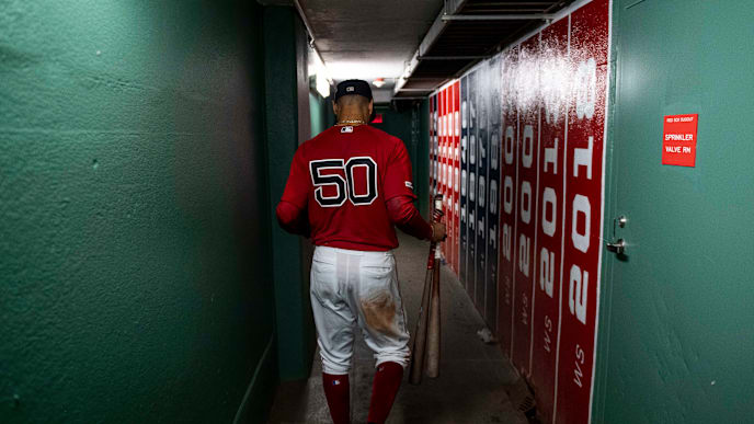 BOSTON, MA - SEPTEMBER 29: Mookie Betts #50 of the Boston Red Sox walks through the tunnel after scoring the game winning run on a walk-off single hit by Rafael Devers #11 during the ninth inning of a game against the Baltimore Orioles on September 29, 2019 at Fenway Park in Boston, Massachusetts. (Photo by Billie Weiss/Boston Red Sox/Getty Images) BOSTON, MA - SEPTEMBER 29: Mookie Betts #50 of the Boston Red Sox walks through the tunnel after scoring the game winning run on a walk-off single hit by Rafael Devers #11 during the ninth inning of a game against the Baltimore Orioles on September 29, 2019 at Fenway Park in Boston, Massachusetts. (Photo by Billie Weiss/Boston Red Sox/Getty Images)