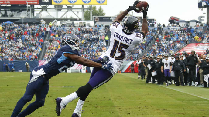 NASHVILLE, TN - OCTOBER 14: Michael Crabtree #15 of the Baltimore Ravens catches a pass to score a touchdown in the first quarter while defended by Malcolm Butler #21 of the Tennessee Titans at Nissan Stadium on October 14, 2018 in Nashville, Tennessee. (Photo by Frederick Breedon/Getty Images) NASHVILLE, TN - OCTOBER 14: Michael Crabtree #15 of the Baltimore Ravens catches a pass to score a touchdown in the first quarter while defended by Malcolm Butler #21 of the Tennessee Titans at Nissan Stadium on October 14, 2018 in Nashville, Tennessee. (Photo by Frederick Breedon/Getty Images)