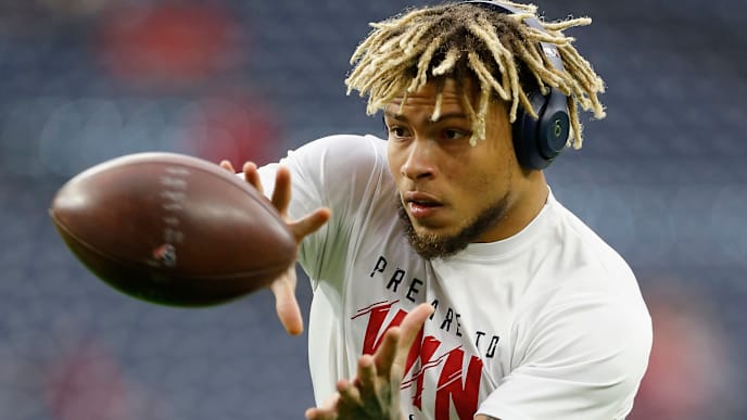 HOUSTON, TX - OCTOBER 14: Tyrann Mathieu #32 of the Houston Texans catches a pass before the game against the Buffalo Bills at NRG Stadium on October 14, 2018 in Houston, Texas. (Photo by Tim Warner/Getty Images) HOUSTON, TX - OCTOBER 14: Tyrann Mathieu #32 of the Houston Texans catches a pass before the game against the Buffalo Bills at NRG Stadium on October 14, 2018 in Houston, Texas. (Photo by Tim Warner/Getty Images)