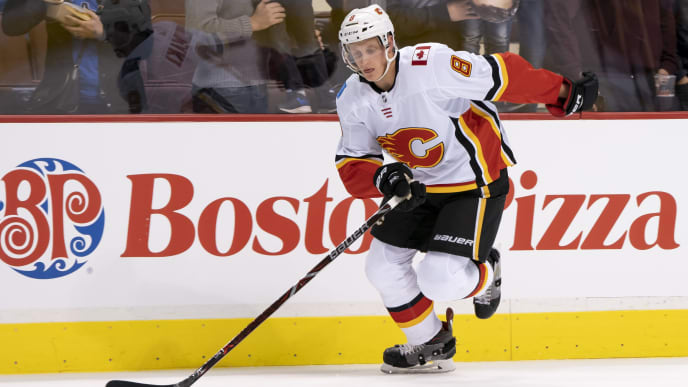 VANCOUVER, BC - OCTOBER 3: Juuso Valimaki #8 of the Calgary Flames skates with the puck during the pre-game warmup prior to NHL action against the Vancouver Canucks on October, 3, 2018 at Rogers Arena in Vancouver, British Columbia, Canada. (Photo by Rich Lam/Getty Images) VANCOUVER, BC - OCTOBER 3: Juuso Valimaki #8 of the Calgary Flames skates with the puck during the pre-game warmup prior to NHL action against the Vancouver Canucks on October, 3, 2018 at Rogers Arena in Vancouver, British Columbia, Canada. (Photo by Rich Lam/Getty Images)